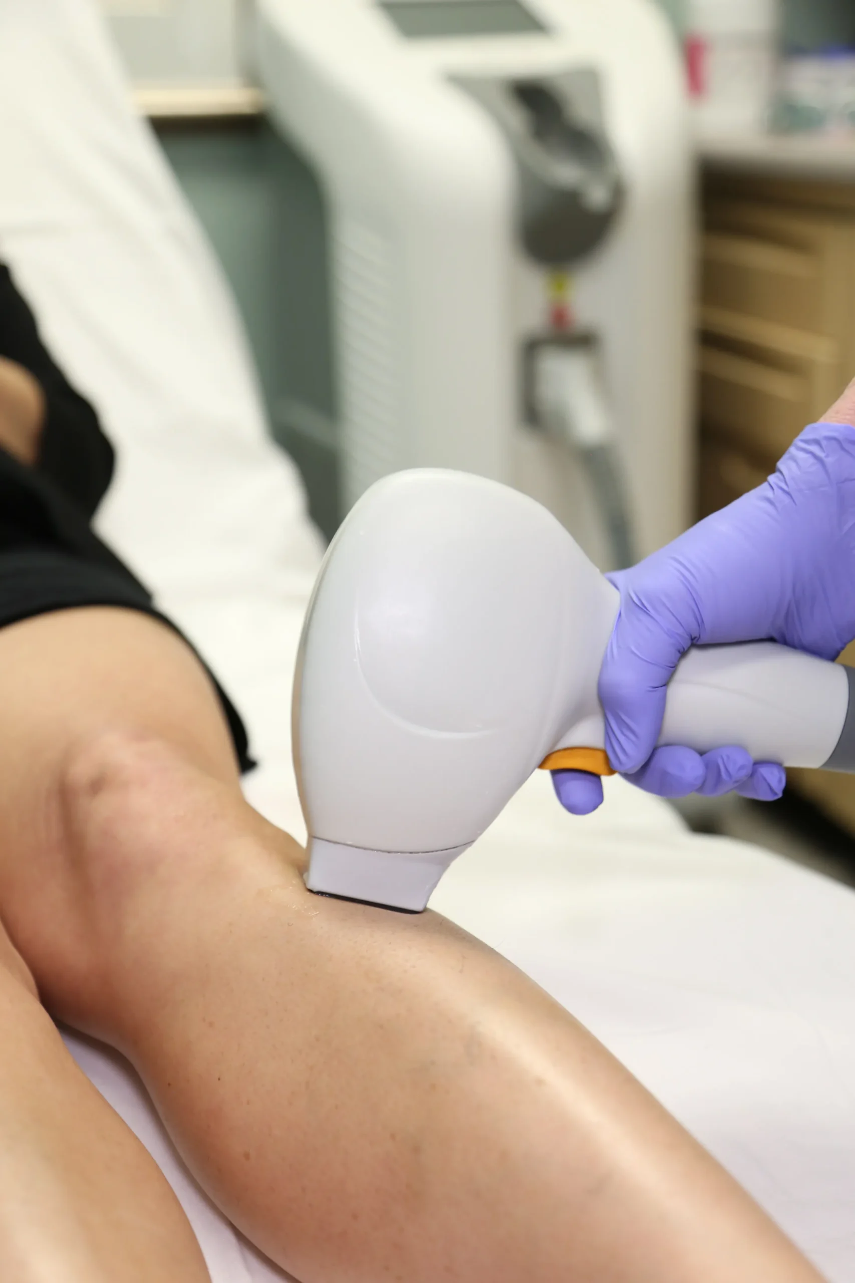 Woman examining skin concerns considering chemical peel treatment at Gold Skin Care Center Nashville