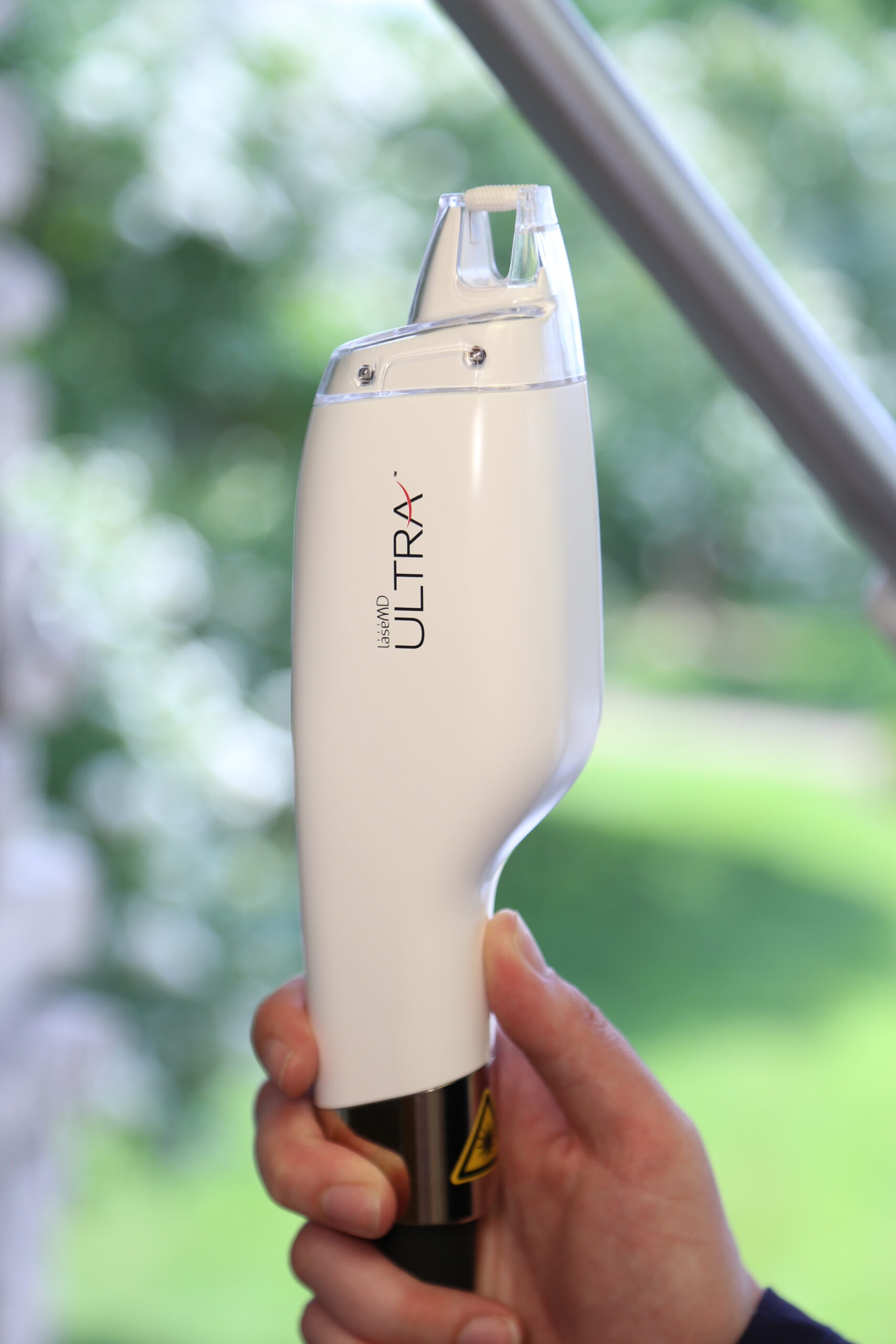 Dermatologist performing ablative laser deep resurfacing treatment on patient in Nashville
